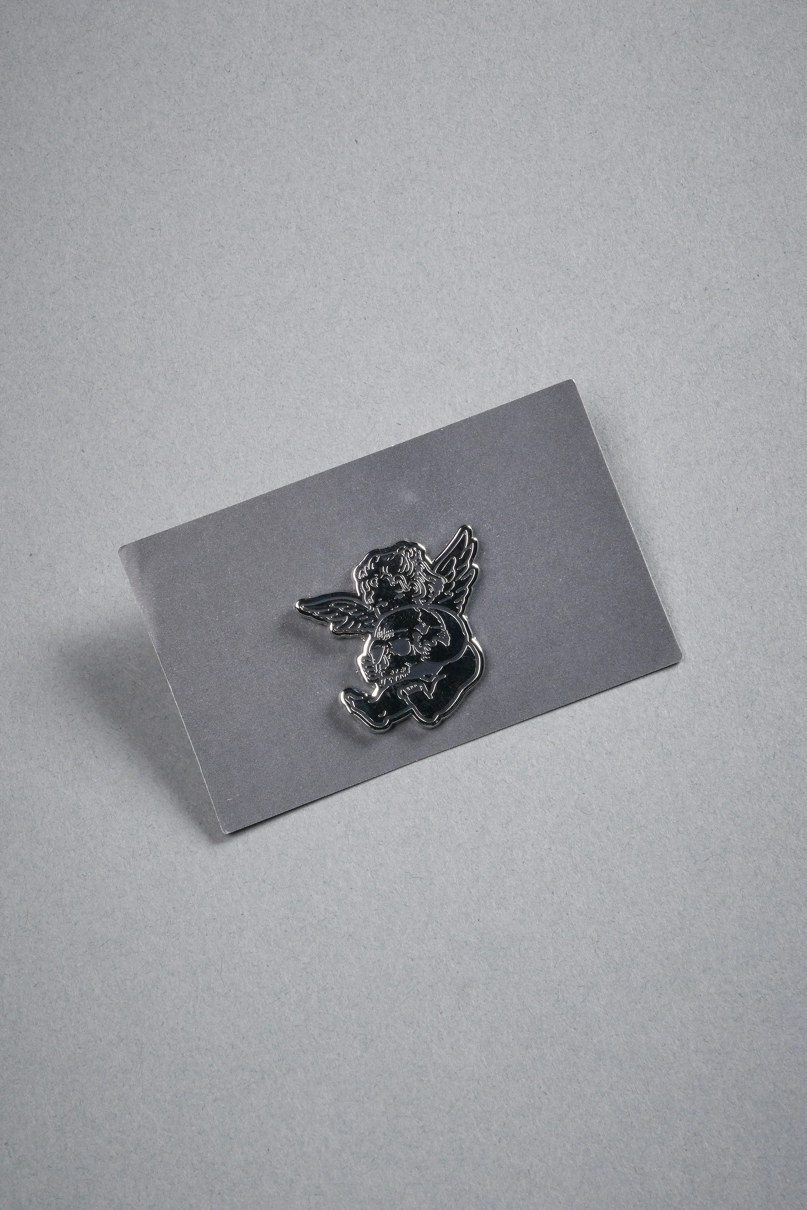 Darc Cherub Enamel Pin in Silver/Black - Image 3