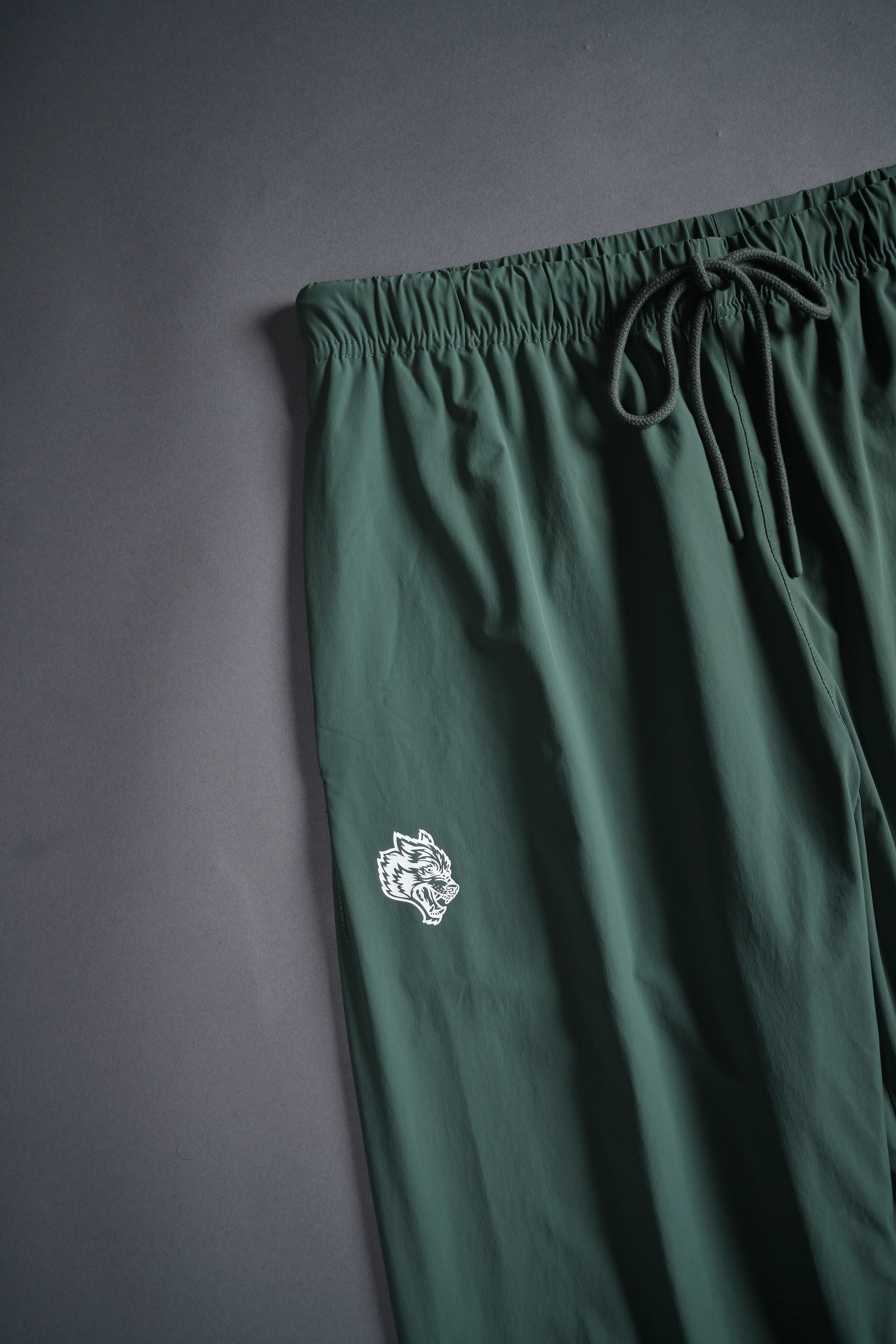 Dual Wolf Head Hybrid Nylon Track Pants in Hunter Green - Image 10