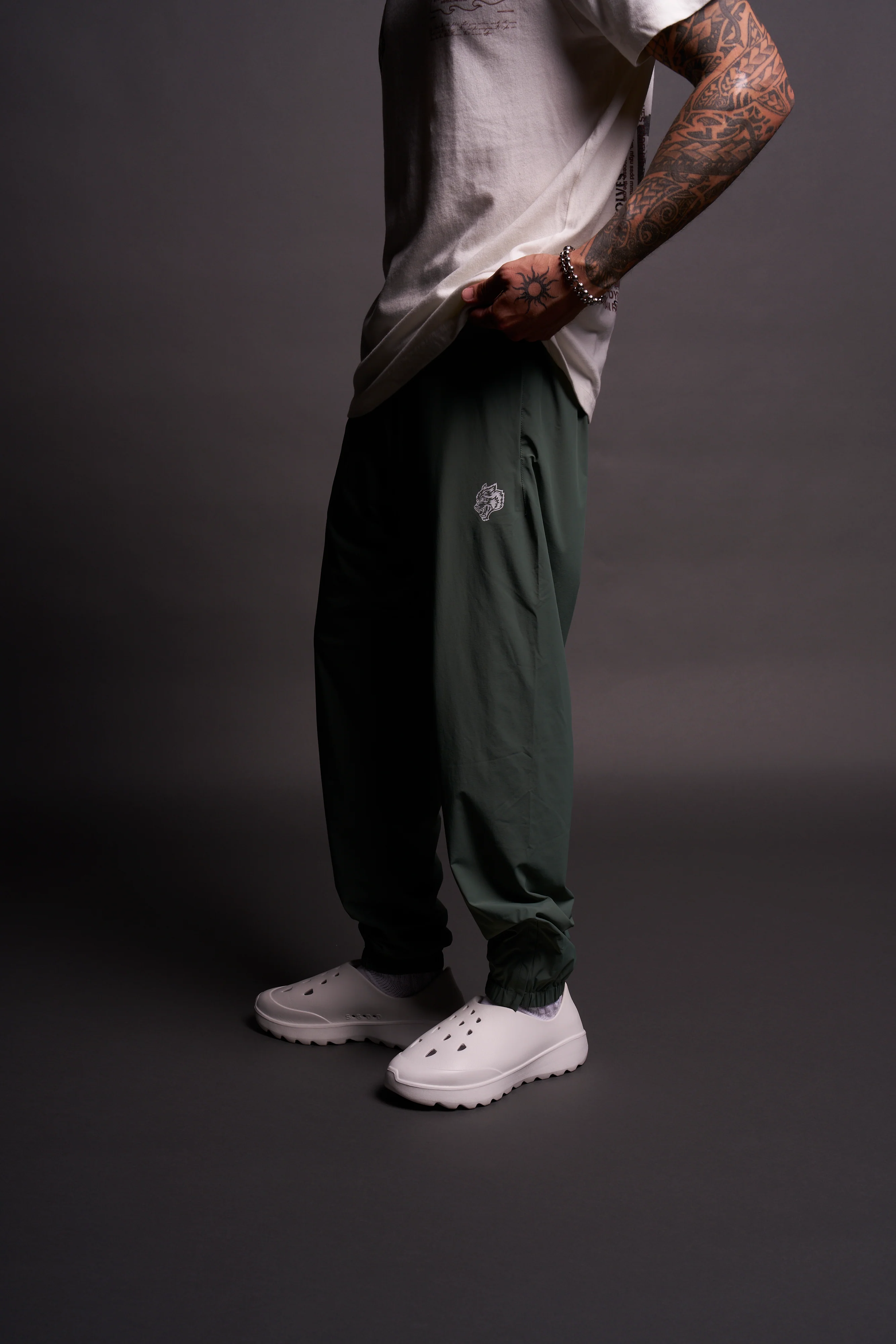 Dual Wolf Head Hybrid Nylon Track Pants in Hunter Green - Image 5