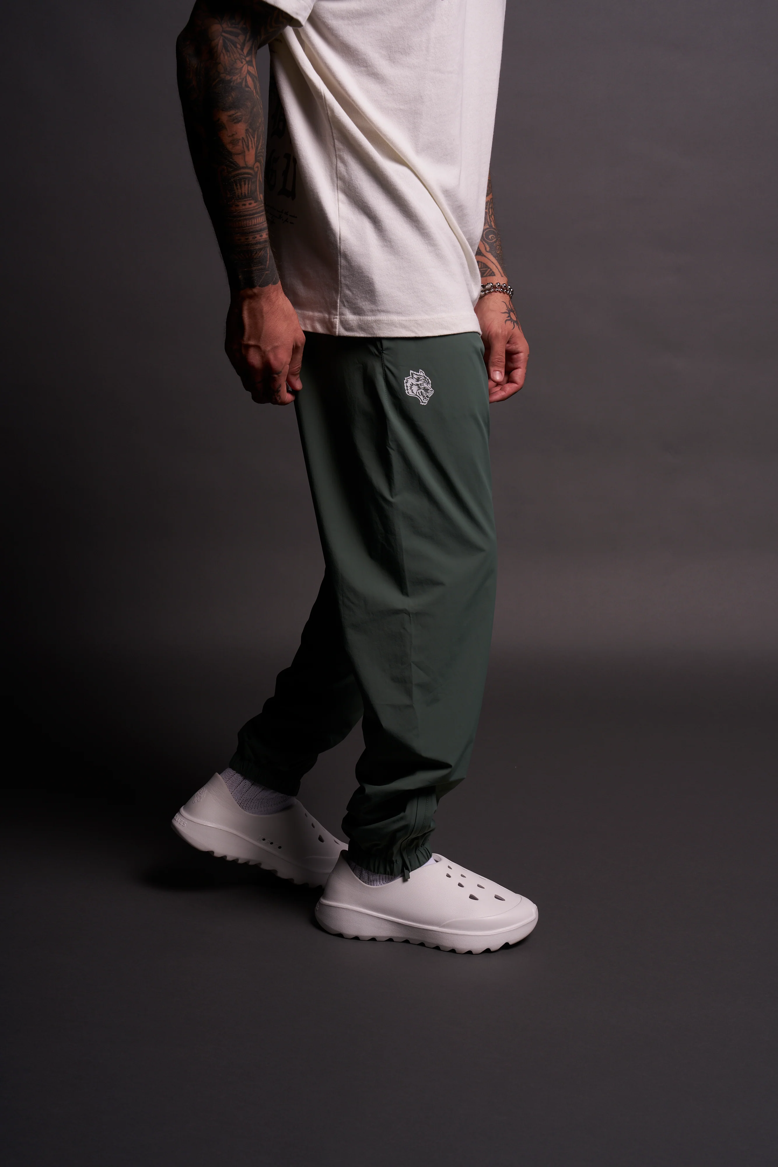 Dual Wolf Head Hybrid Nylon Track Pants in Hunter Green - Image 8