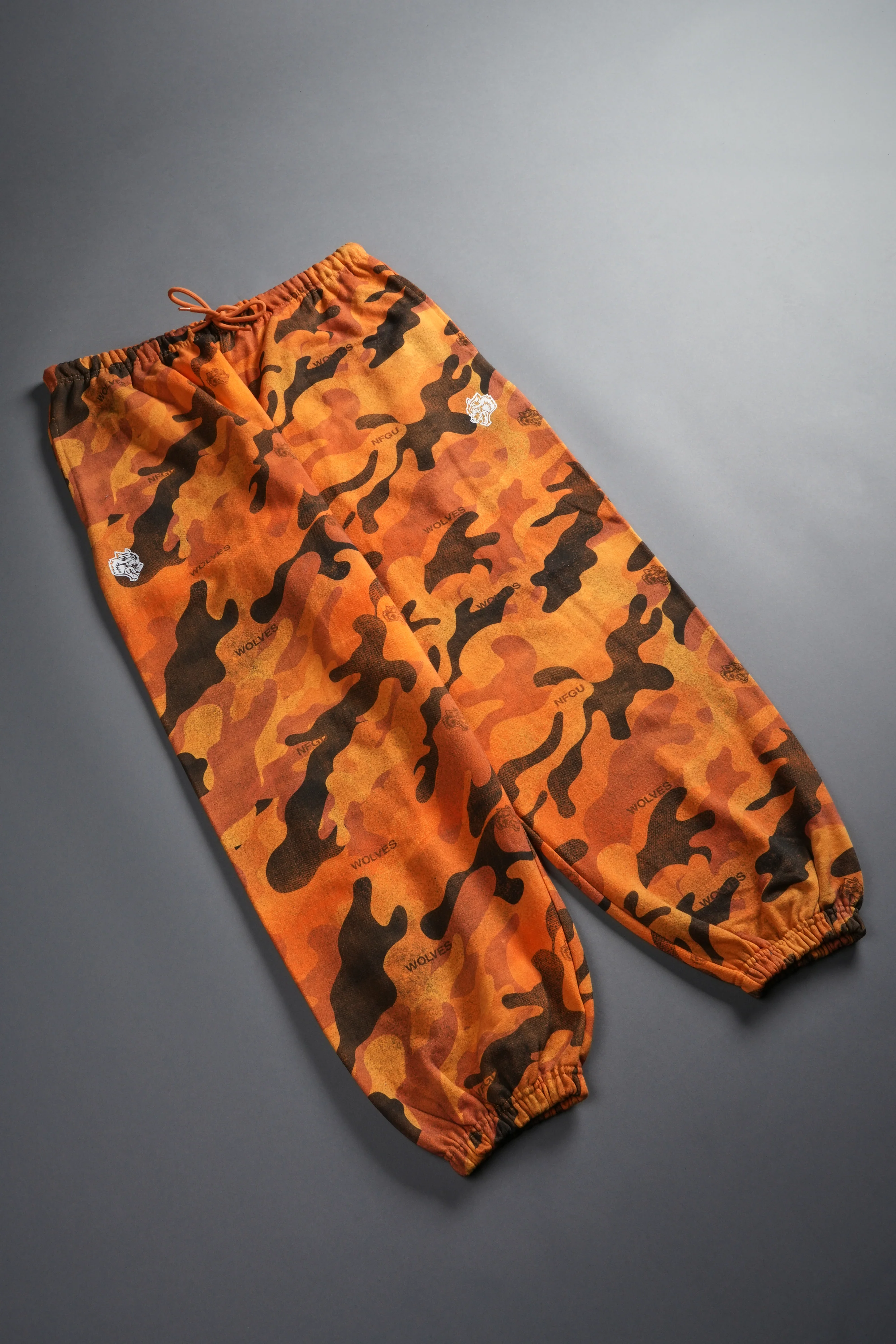 Dual Wolf Unisex Lounger Sweat Pants in DSVD Orange Camo - Image 14