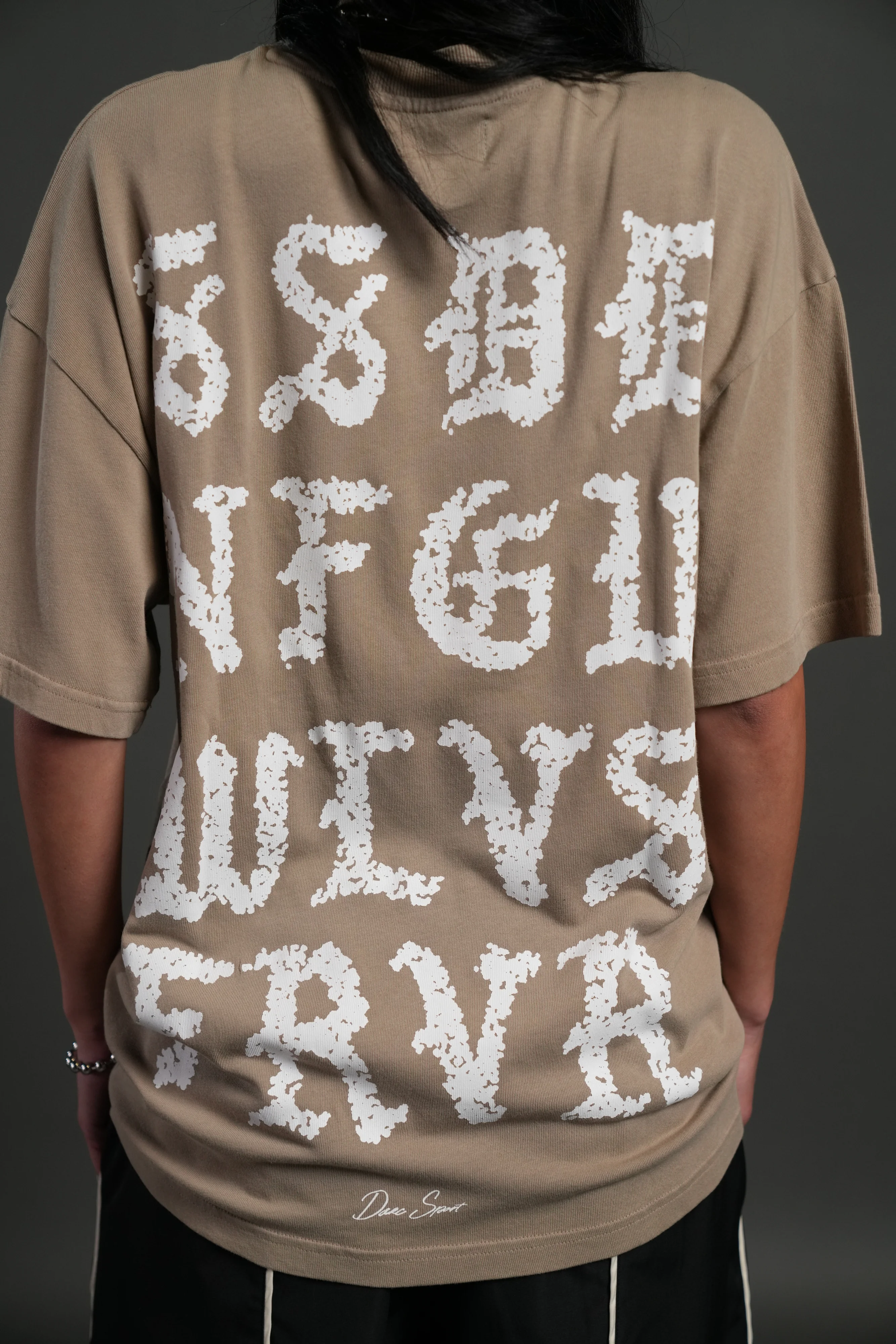 Stone Code "Pump Cover" Tee in Taupe - Image 5