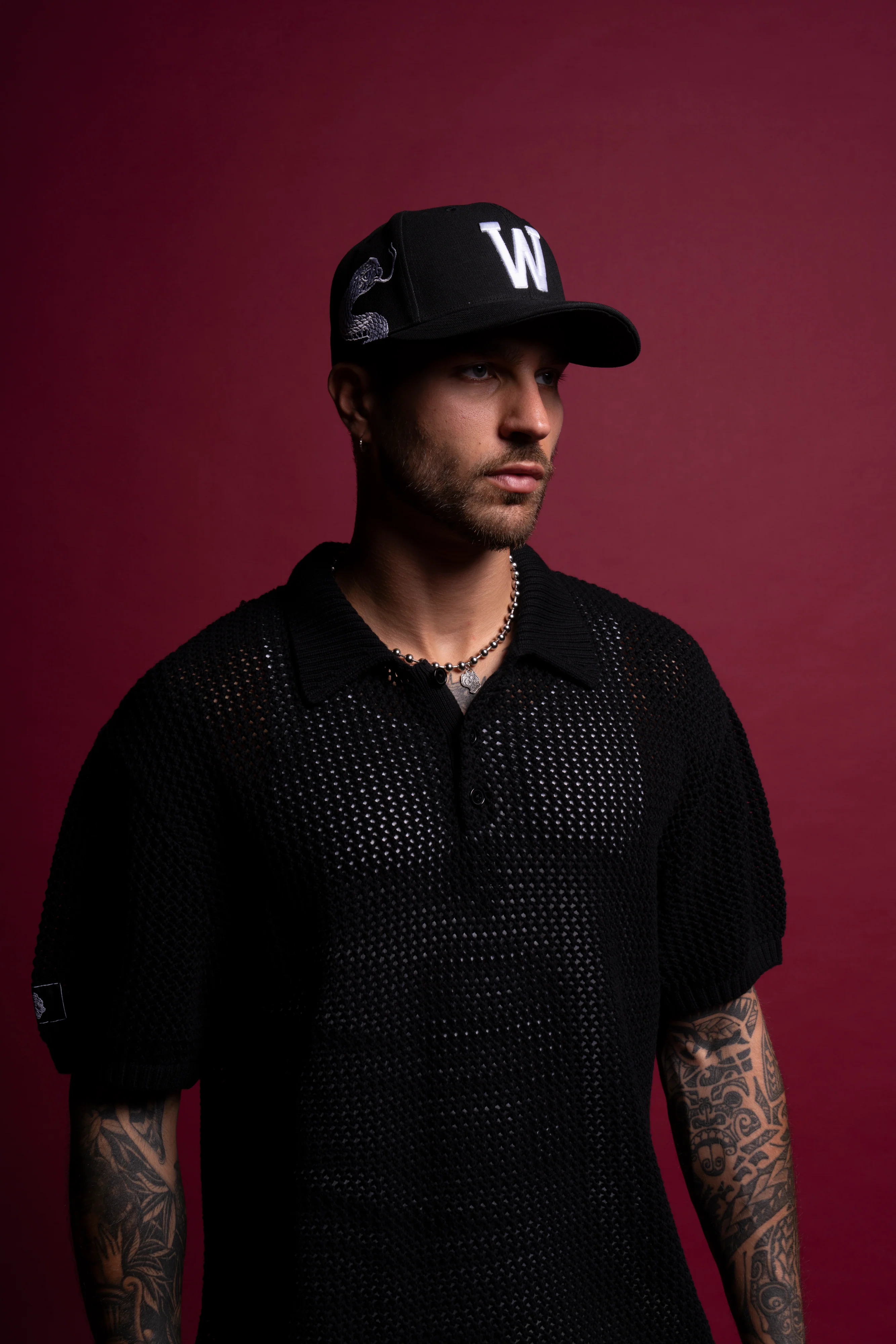 Wolf Patch Claude Knit Polo in Black - Image 11